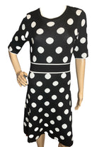 London Times Black and White fit and flared sweater material like style dress(size Medium)