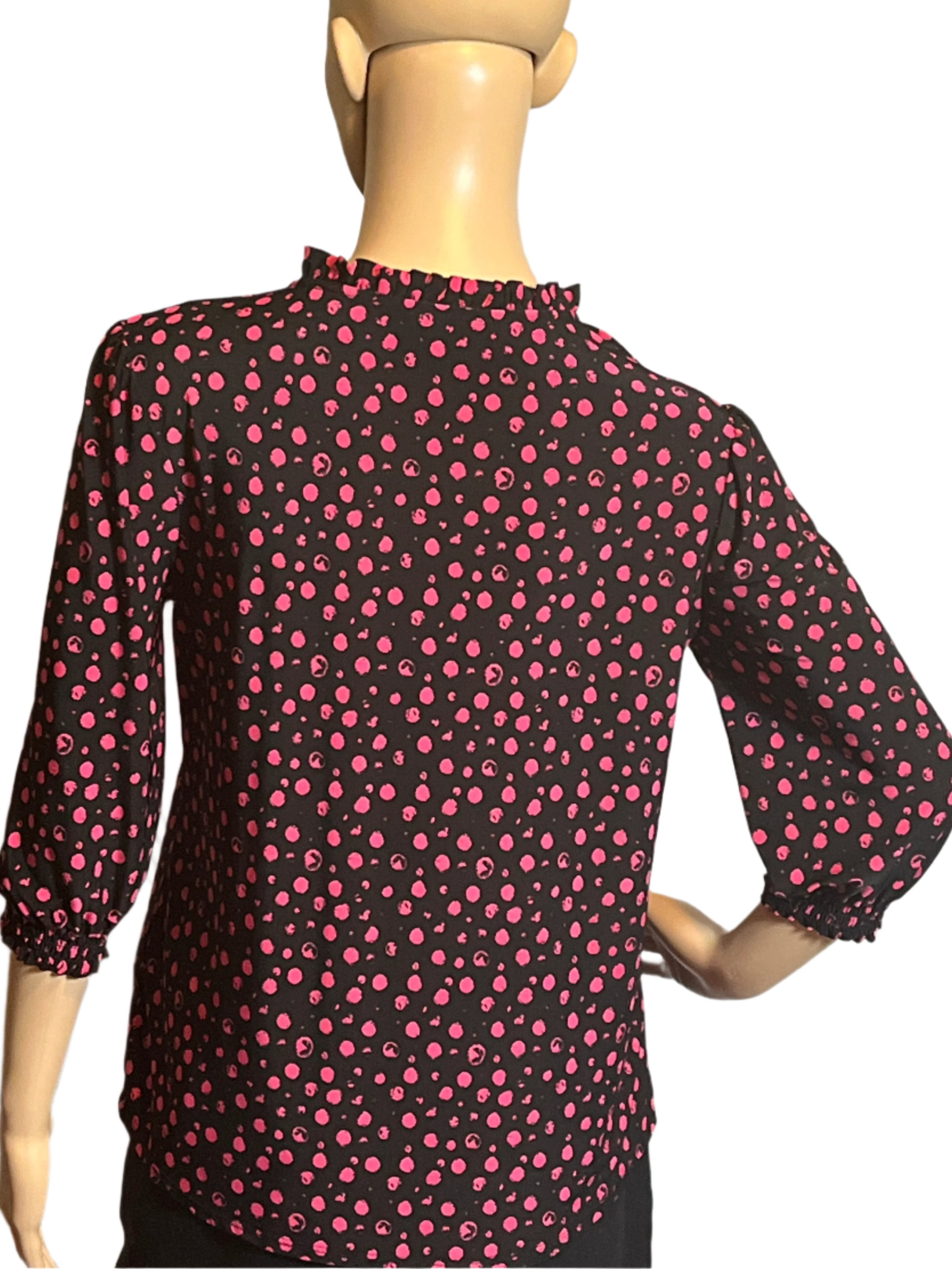 Casual or workwear 3/4 Sleeved women’s black with pink distinct pattern pull over shirt/blouse (size Petite small) from Cocomo.