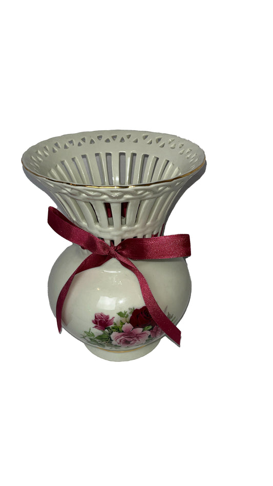 Porcelain Beautifully Crafted Vase (with distinct red ribbon)