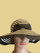 Beautiful black and beige hat with nice ribbon by Sun Sand