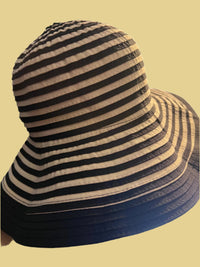 Beautiful black and beige hat with nice ribbon by Sun Sand