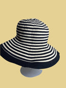 Beautiful black and beige hat with nice ribbon by Sun Sand