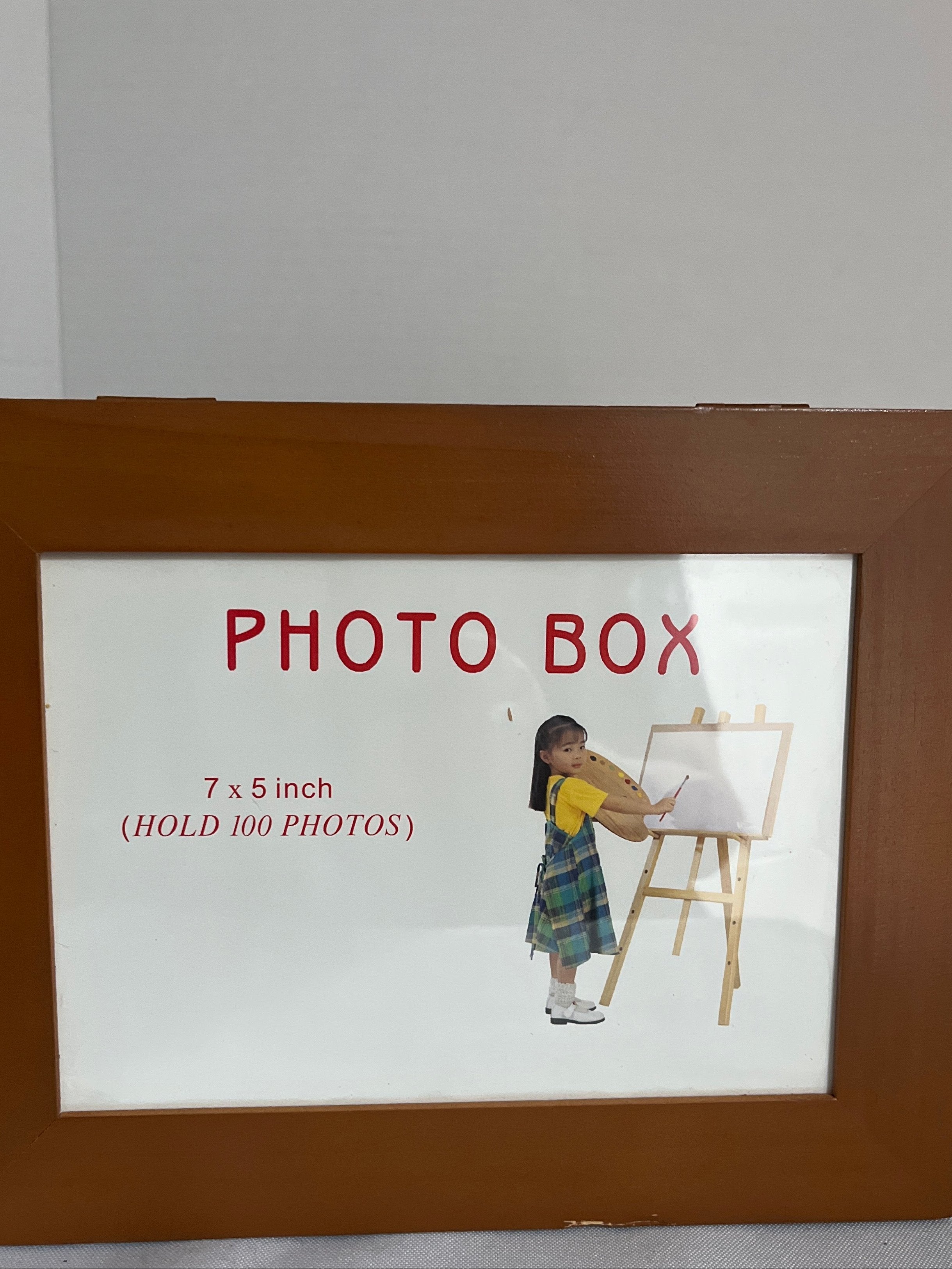 Photo box with with multiple photo display frames around the box