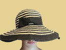 Beautiful black and beige hat with nice ribbon by Sun Sand